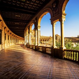 panish Square (Plaza de Espana) in Sevilla at sunset, Spain.