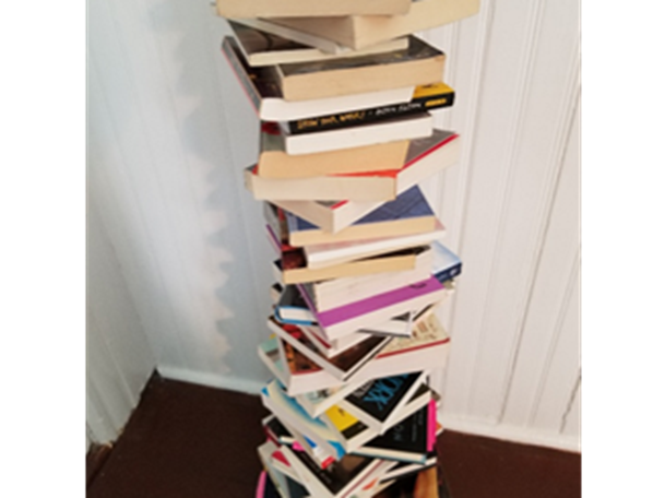 Stack of books on floor 