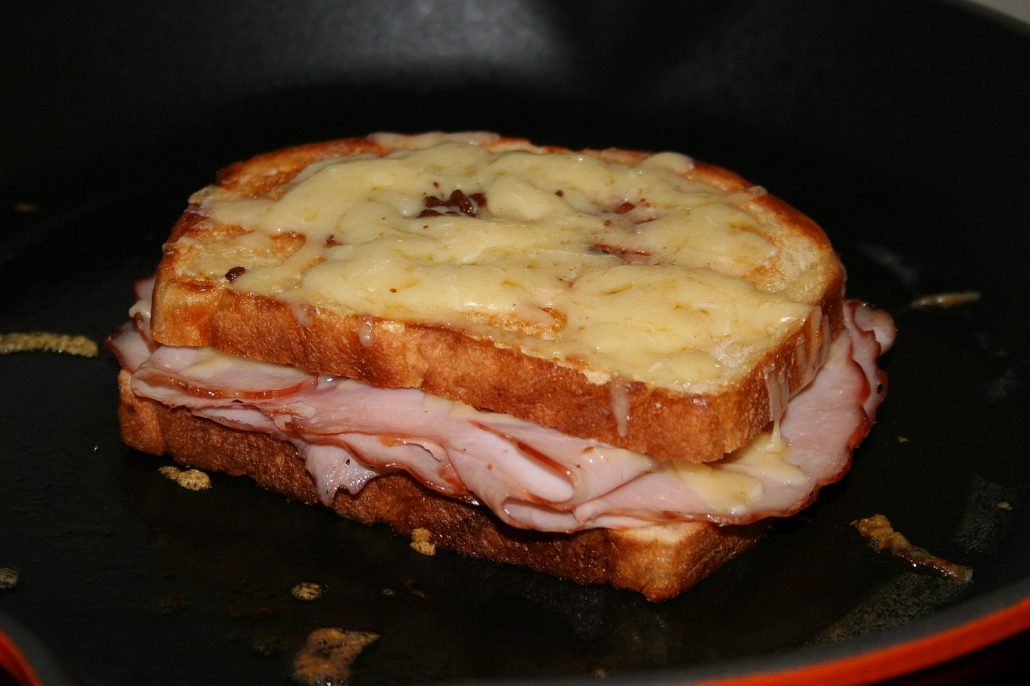 Croque Monsieur sandwich - ham and cheese on bread with cheese melted on top 