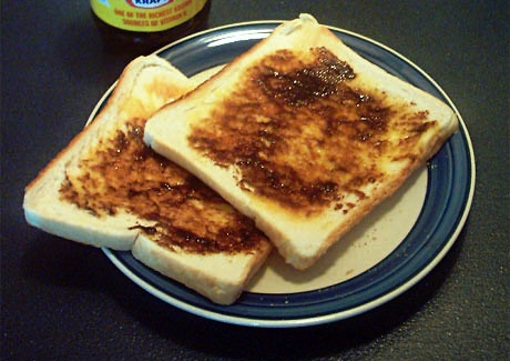 Vegemite spread on two pieces of toast 