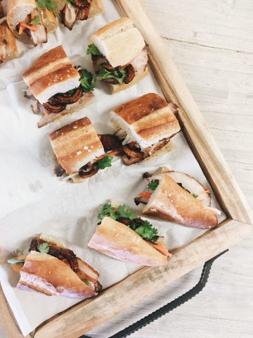 Slices of bahn mi sandwich on a board